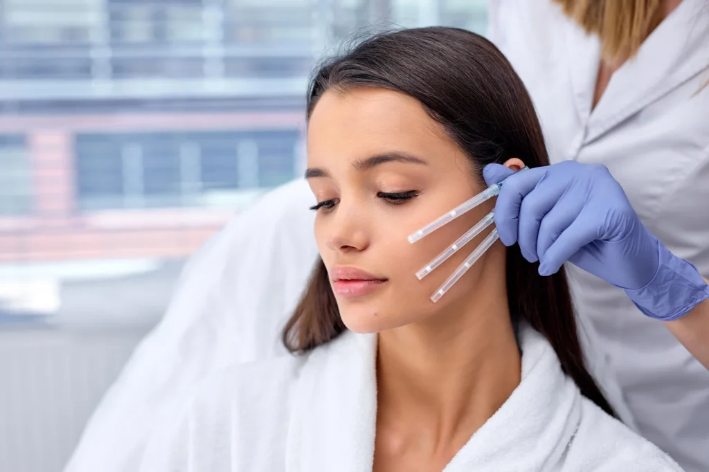 a woman getting a botox injection