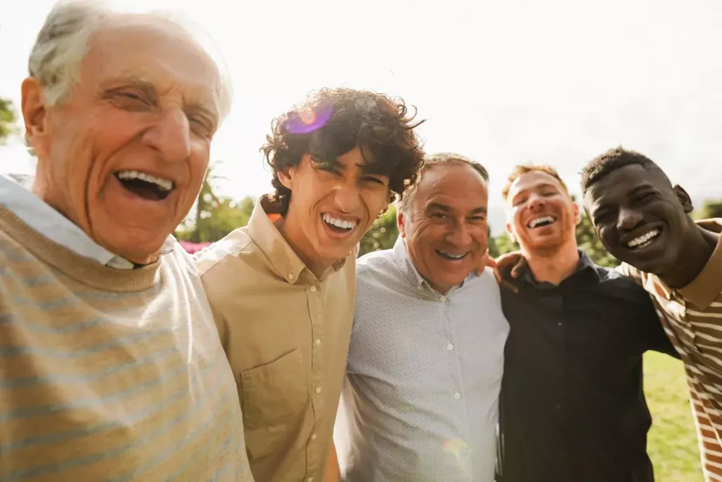 a group of men smiling