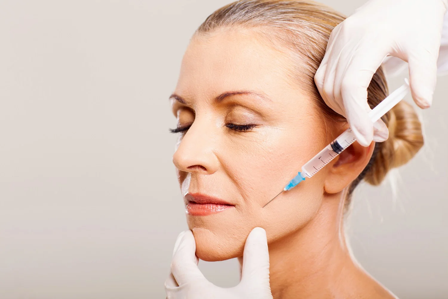 a woman getting botox injection